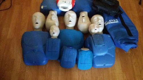 5 adults 2 infants cpr manikins and 1 aed trainer