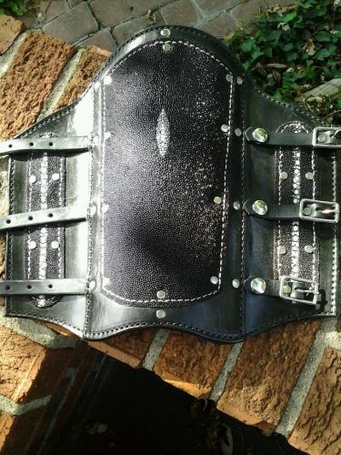 Welders sleeve. Made with leather and genuine stingray. 12 &#034; in length.