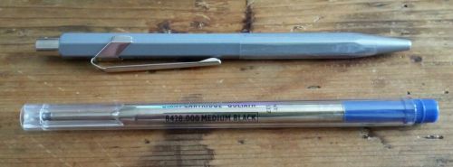 caran d&#039;ache silver 849 original ballpoint pen w/ new black ballpoint refill