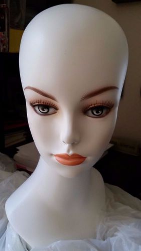 White mannequin head with painted on makeup and earring holes store your wigs for sale