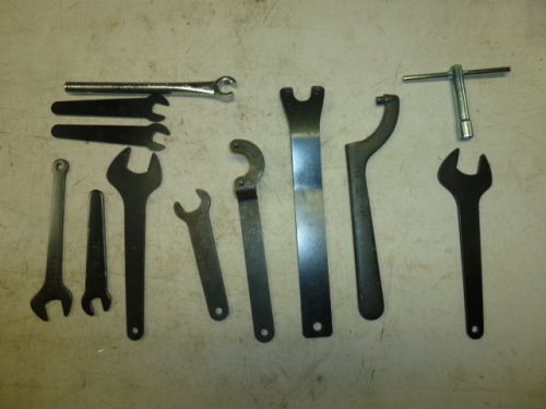 LOT of (12) POWER TOOL WRENCHES, GRINDERS, SAWS, BLADE ADJUSTMENT TOOLS