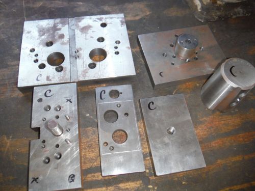 Pile of steel metal plate setup jigs fixtures from shop with moore jig grinder c for sale