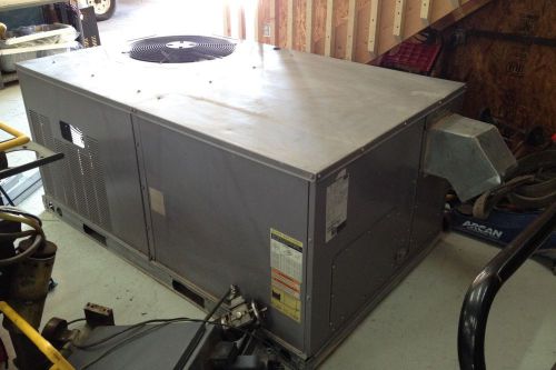 &#034;carrier&#034; rooftop heat pump unit; model: 50tfq004; 5 ton capacity; 460v, r22 for sale
