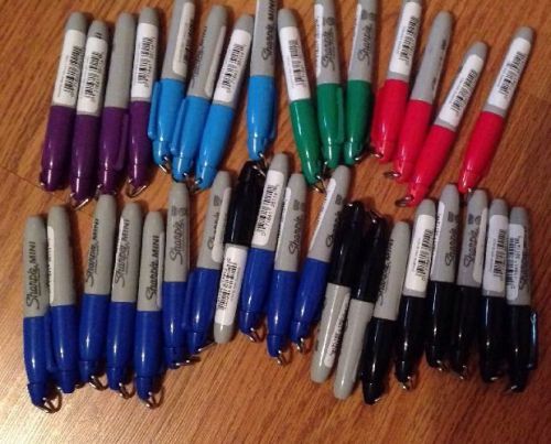 34 brand new mini sharpie pens with clip lids.  6 assorted colors.