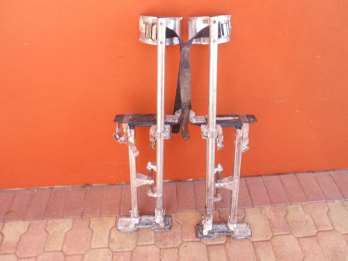drywall stilts. aluminum. adjustable. PICK UP ONLY. S. TAMPA.33629