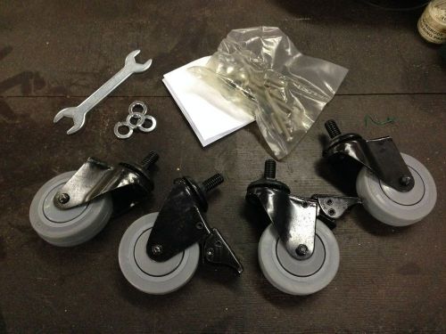 Brand New Set of Hard Rubber Caster Wheels With Brakes