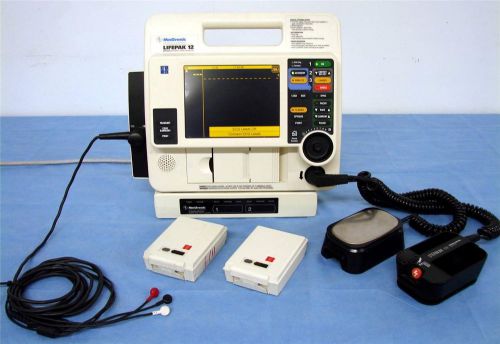 Lifepak 12 biphasic 3 lead ecg aed pacing paddles 2 batteries ac power adapter for sale