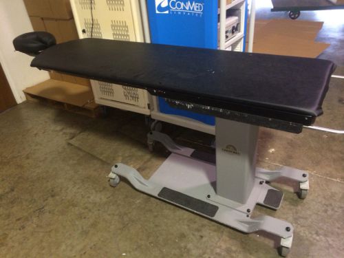 Oakworks model cfpmfxh fixed height c-arm imaging pain management table for sale