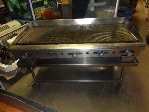 IMPERIAL IGG-60 FLAT TOP 60&#034; NATURAL GAS GROOVED GRIDDLE AND EQUIPMENT STAND.