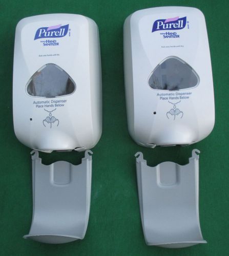 Lot of 2  new purell tfx  touch free dispensers  2720  w/ splash guard by gojo for sale