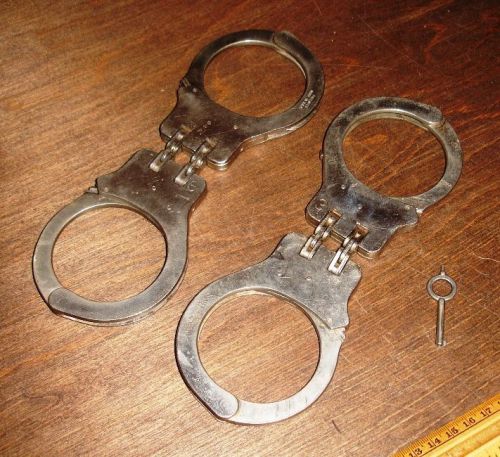 2 Pairs of Peerless Handcuffs Hinged 1 Key Great condition