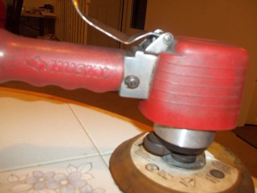 industrial orbital sander used for 6 months  comes with 6 inch sticky pad