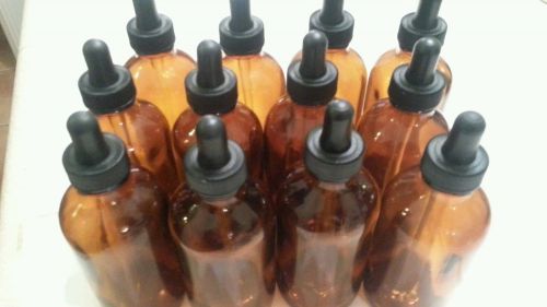 12-4 oz. (120ml) Amber Boston Round Glass Bottles with glass pipette droppers.