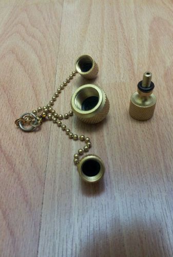 Vacuum Pump Cap Kit with Chains on one common ring.