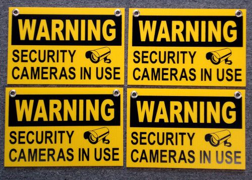 4 WARNING SECURITY CAMERAS IN USE SIGNS 8&#034;x12&#034;   NEW with Grommets  Surveillance