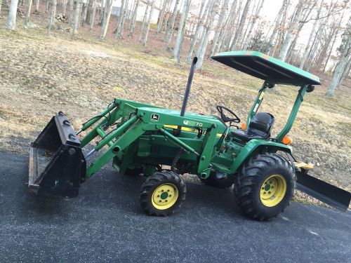 John deere 770 tractor with bucket blade brush hog + power beyound kit for sale