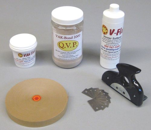 Veneering kit with wood glue, veneer softener, and veneer cutter.