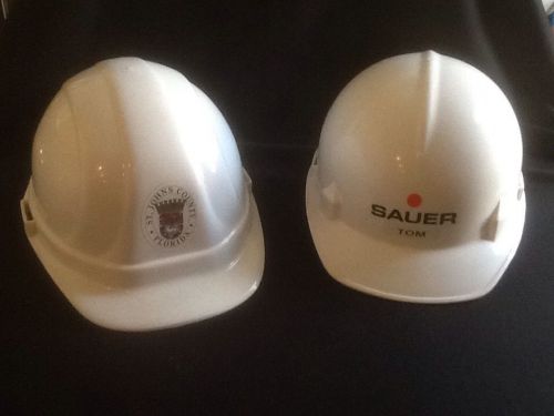2 hard hats. st. johns county florida &amp; sauer incorporated. for sale