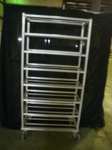 Rolling storage rack with 8 fixed bar shelves