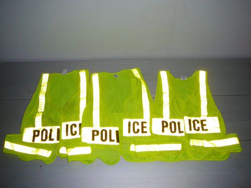 Lot of 16 flourescent reflective safety and police traffic vests.