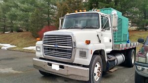 1997 Ford F700 truck and mounted generator