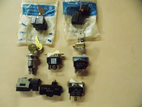 (9) assorted small switches rocker,key and push