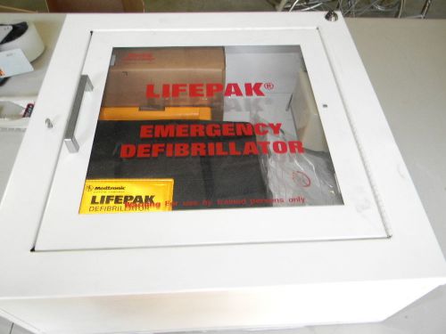 Medtronic lifepak 500, electrodes, new battery, old battery, data cable, cabinet for sale
