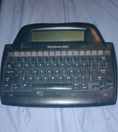 AlphaSmart 3000 with power cord and USB transfer cord