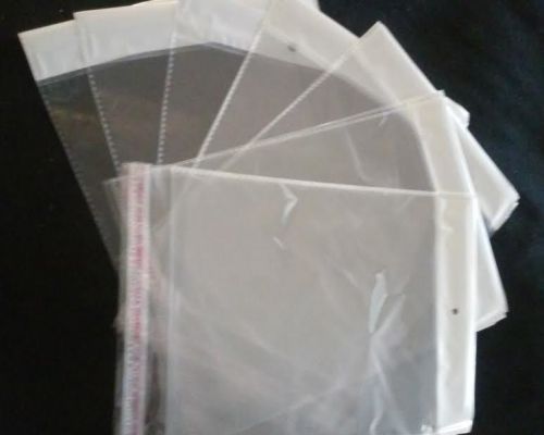 NEW QTY:100 - 10 X 7 Clear Resealable Poly Cello Cellophane Bags w/ Hang Hole