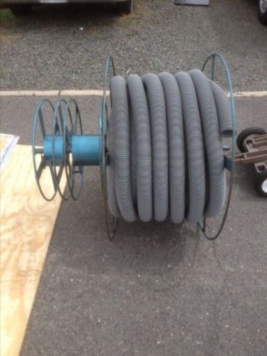 Carpet cleaning hose reel