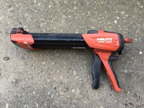 Hilti HDM 500 Manual Anchor Adhesive Dispenser with cardboard box and manual