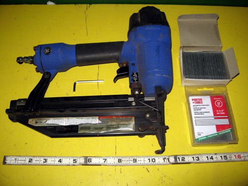 Campbell Hausefeld air powered nailer with 2 boxes nails