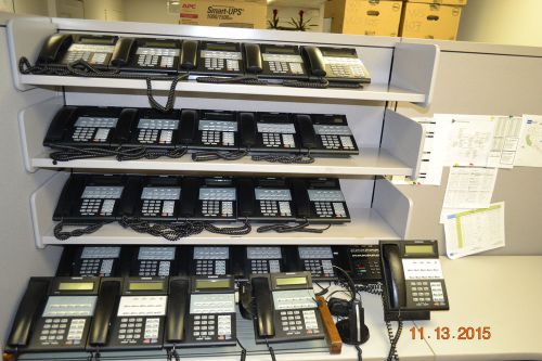 25 Samsung iDCS 18D phones with stands and 1 Samsung LCD-12B Keyset DCS w/ stand