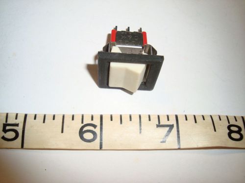 C&amp;K 7101 On none On White Rocker Switch with Bezel 2a 250vac 5a 125vac