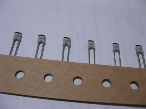 Tape of 100 Ceramic Capacitors 68pF 100VDC 1% NPO Marcon NOS