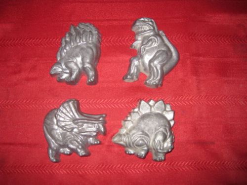4 lead dinosaurs figures 3 to 4 inches each
