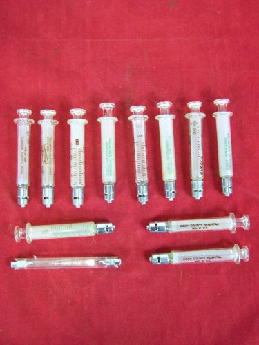 LOT OF 11 GLASS SYRINGES WITH 2PACK OF NEEDLES 2CC VINTAGE ALL WORKING B-D YALE