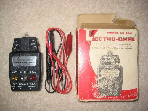 Lectro-Chek Model LC-300 AC DC Tester in box with built in flashlight