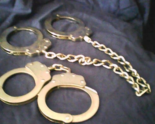 Peerless handcuffs and leg cuffs.