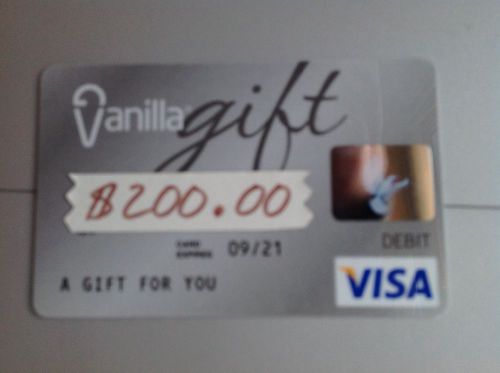 200.00 Dollar NEW Unused Visa Card - it is however opened so I could photograph!