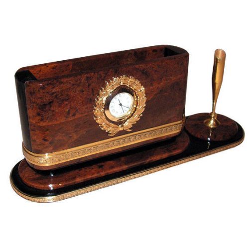 Writing desk organization accessory made of obsidian and brass with clock etc