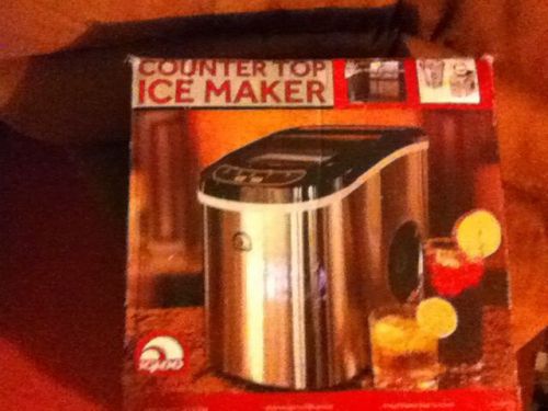 stainless steel counter top ice machine  barely used in box.