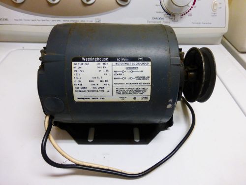 WESTINGHOUSE 1/4 HORSE ELECTRIC MOTOR WITH  MOUNTING BASE AND PULLEY