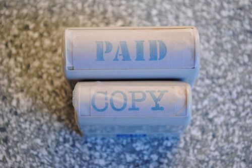 &#039;PAID&#039; &amp; &#039;COPY&#039; self inking stamps in blue ink.