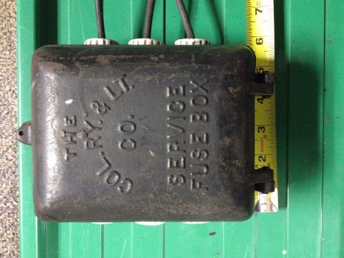 Vintage electrical service fuse box and throw knife switch