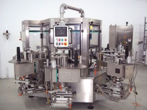 Hoppmann front and back rotary labeler with 4 labeling heads *tested* for sale