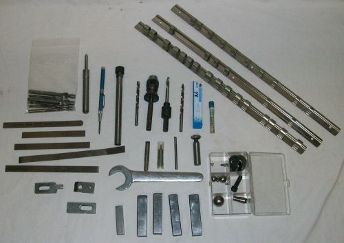 Large collection of metal working tools and parts: cutters, clamps, gauge, chuck for sale