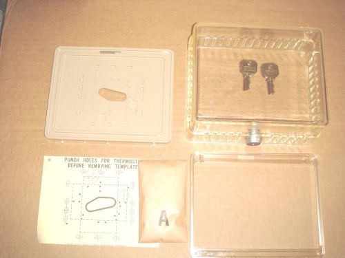 HONEYWELL TG500A 1003 UNIVERSAL THERMOSTAT GUARD NIB complete with keys