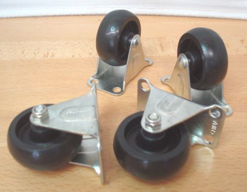 4 hard rubber and metal straight rigid 2&#034; casters wheels 1.5&#034;w x 3&#034;l x 2.5&#034;h for sale