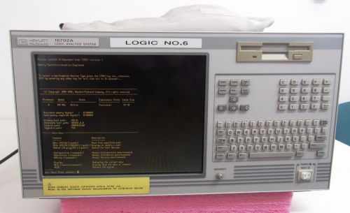 HP/AGILENT 16702A-LOGIC ANAL.SYST.-1xHP16534A &amp; 2xHP16555A-POWER ON-USED-II